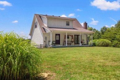 Welcome to this cozy Kentucky home neighboring the golf course! on Hickory Hills Country Club in Kentucky - for sale on GolfHomes.com, golf home, golf lot