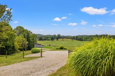 Welcome to this cozy Kentucky home neighboring the golf course! on Hickory Hills Country Club in Kentucky - for sale on GolfHomes.com, golf home, golf lot