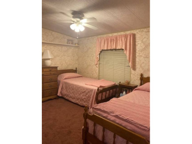 TIRED OF SNOW,ICE AND COLD, TRADE IT IN FOR SUN,WARM AND WHITE on Pine Lakes Country Club in Florida - for sale on GolfHomes.com, golf home, golf lot