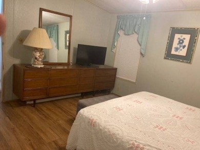 TIRED OF SNOW,ICE AND COLD, TRADE IT IN FOR SUN,WARM AND WHITE on Pine Lakes Country Club in Florida - for sale on GolfHomes.com, golf home, golf lot
