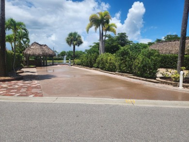 Well appointed back in lot with Tiki on the natural pond.  Soak on St. Lucie Trail Golf Club in Florida - for sale on GolfHomes.com, golf home, golf lot