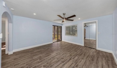 Move right into this beautifully updated first-floor condo on East Lake Woodlands Country Club in Florida - for sale on GolfHomes.com, golf home, golf lot
