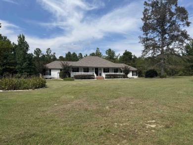 Exquisite 3.3-Acre Estate in Rayburn Country! Unrestricted on 3 on Rayburn Country Club in Texas - for sale on GolfHomes.com, golf home, golf lot