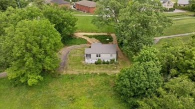 Charming 3BR, 2BA home on an oversized lot with extended private on Somerset Country Club in Kentucky - for sale on GolfHomes.com, golf home, golf lot