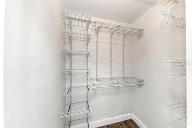 Move right into this beautifully updated first-floor condo on East Lake Woodlands Country Club in Florida - for sale on GolfHomes.com, golf home, golf lot