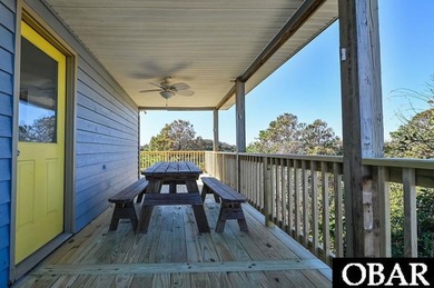 Sitting well elevated in an X flood zone, Sunny Days is located on The Currituck Golf Club in North Carolina - for sale on GolfHomes.com, golf home, golf lot