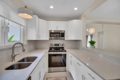 Fabulous St Davids, gorgeous renovations, move in condition and on Grand Harbor Golf and Country Club in Florida - for sale on GolfHomes.com, golf home, golf lot