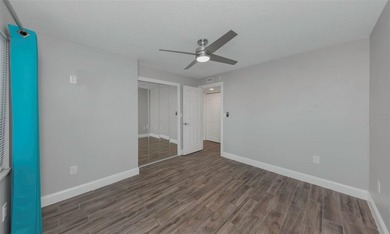 Move right into this beautifully updated first-floor condo on East Lake Woodlands Country Club in Florida - for sale on GolfHomes.com, golf home, golf lot