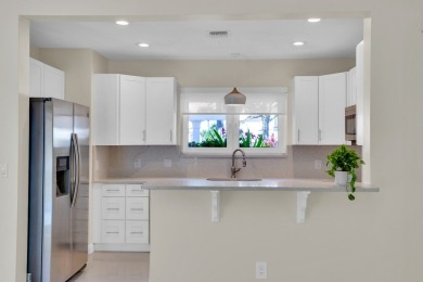Fabulous St Davids, gorgeous renovations, move in condition and on Grand Harbor Golf and Country Club in Florida - for sale on GolfHomes.com, golf home, golf lot