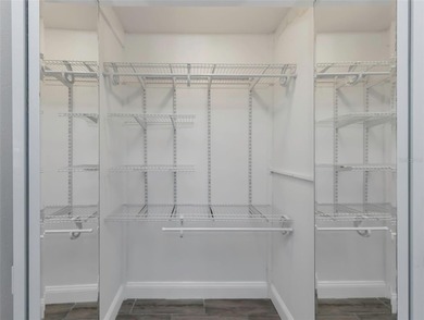 Move right into this beautifully updated first-floor condo on East Lake Woodlands Country Club in Florida - for sale on GolfHomes.com, golf home, golf lot