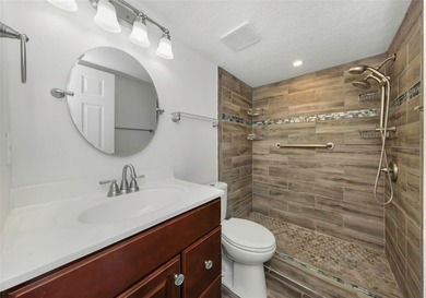 Move right into this beautifully updated first-floor condo on East Lake Woodlands Country Club in Florida - for sale on GolfHomes.com, golf home, golf lot