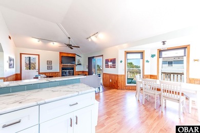 Sitting well elevated in an X flood zone, Sunny Days is located on The Currituck Golf Club in North Carolina - for sale on GolfHomes.com, golf home, golf lot