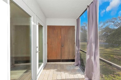 Move right into this beautifully updated first-floor condo on East Lake Woodlands Country Club in Florida - for sale on GolfHomes.com, golf home, golf lot