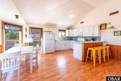 Sitting well elevated in an X flood zone, Sunny Days is located on The Currituck Golf Club in North Carolina - for sale on GolfHomes.com, golf home, golf lot