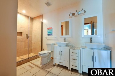 Sitting well elevated in an X flood zone, Sunny Days is located on The Currituck Golf Club in North Carolina - for sale on GolfHomes.com, golf home, golf lot