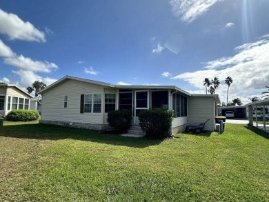 Welcome to this beautifully remodeled 3-bedroom, 2-bathroom home on Four Lakes Golf Club in Florida - for sale on GolfHomes.com, golf home, golf lot