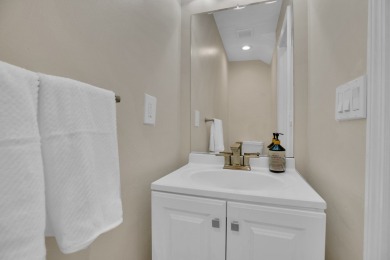 Fabulous St Davids, gorgeous renovations, move in condition and on Grand Harbor Golf and Country Club in Florida - for sale on GolfHomes.com, golf home, golf lot