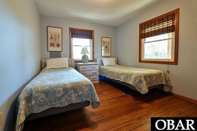 Sitting well elevated in an X flood zone, Sunny Days is located on The Currituck Golf Club in North Carolina - for sale on GolfHomes.com, golf home, golf lot