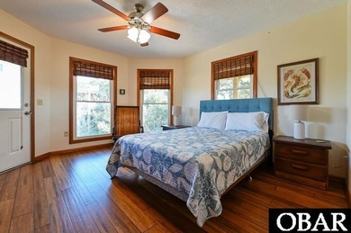 Sitting well elevated in an X flood zone, Sunny Days is located on The Currituck Golf Club in North Carolina - for sale on GolfHomes.com, golf home, golf lot