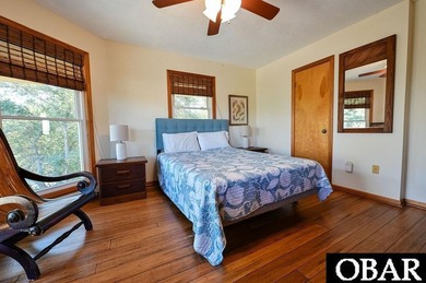 Sitting well elevated in an X flood zone, Sunny Days is located on The Currituck Golf Club in North Carolina - for sale on GolfHomes.com, golf home, golf lot