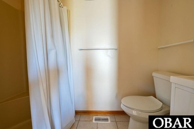 Sitting well elevated in an X flood zone, Sunny Days is located on The Currituck Golf Club in North Carolina - for sale on GolfHomes.com, golf home, golf lot