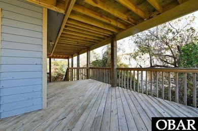Sitting well elevated in an X flood zone, Sunny Days is located on The Currituck Golf Club in North Carolina - for sale on GolfHomes.com, golf home, golf lot