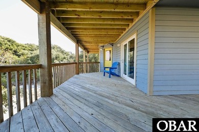 Sitting well elevated in an X flood zone, Sunny Days is located on The Currituck Golf Club in North Carolina - for sale on GolfHomes.com, golf home, golf lot