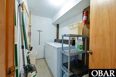 Sitting well elevated in an X flood zone, Sunny Days is located on The Currituck Golf Club in North Carolina - for sale on GolfHomes.com, golf home, golf lot