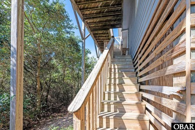 Sitting well elevated in an X flood zone, Sunny Days is located on The Currituck Golf Club in North Carolina - for sale on GolfHomes.com, golf home, golf lot