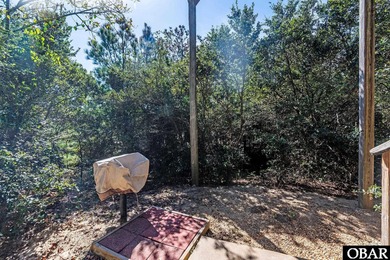 Sitting well elevated in an X flood zone, Sunny Days is located on The Currituck Golf Club in North Carolina - for sale on GolfHomes.com, golf home, golf lot