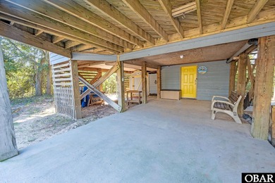 Sitting well elevated in an X flood zone, Sunny Days is located on The Currituck Golf Club in North Carolina - for sale on GolfHomes.com, golf home, golf lot