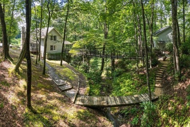 Welcome to the Bridge House -- Your Private Mountain Escape on Sapphire National Golf Club in North Carolina - for sale on GolfHomes.com, golf home, golf lot