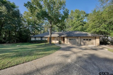 Welcome to this beautifully maintained and updated home in the on Hide-A-Way Lake Golf Course in Texas - for sale on GolfHomes.com, golf home, golf lot