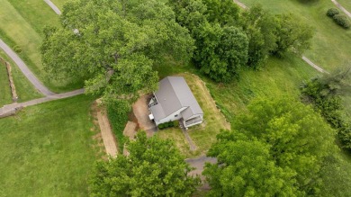 Charming 3BR, 2BA home on an oversized lot with extended private on Somerset Country Club in Kentucky - for sale on GolfHomes.com, golf home, golf lot
