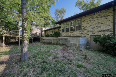 Welcome to this beautifully maintained and updated home in the on Hide-A-Way Lake Golf Course in Texas - for sale on GolfHomes.com, golf home, golf lot