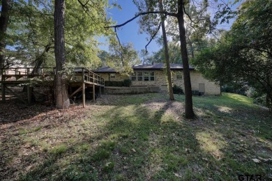 Welcome to this beautifully maintained and updated home in the on Hide-A-Way Lake Golf Course in Texas - for sale on GolfHomes.com, golf home, golf lot