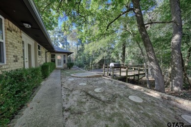 Welcome to this beautifully maintained and updated home in the on Hide-A-Way Lake Golf Course in Texas - for sale on GolfHomes.com, golf home, golf lot