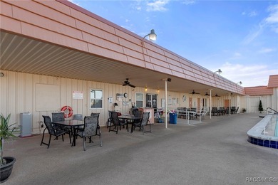 Spacious and well-maintained 2-bedroom, 2-bath home located in a on High Point Golf Club, Inc. in Florida - for sale on GolfHomes.com, golf home, golf lot