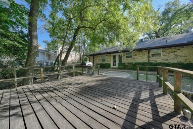 Welcome to this beautifully maintained and updated home in the on Hide-A-Way Lake Golf Course in Texas - for sale on GolfHomes.com, golf home, golf lot