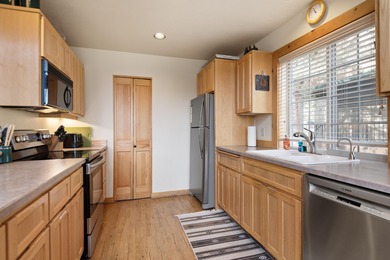 Nestled overlooking the 17th green & fairway of The Ridge Course on Eagle Crest Golf Resort - Resort Course in Oregon - for sale on GolfHomes.com, golf home, golf lot