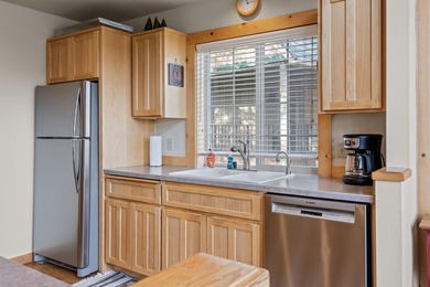 Nestled overlooking the 17th green & fairway of The Ridge Course on Eagle Crest Golf Resort - Resort Course in Oregon - for sale on GolfHomes.com, golf home, golf lot