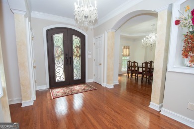 Welcome to this stunning custom ranch home in the prestigious on Whitewater Creek in Georgia - for sale on GolfHomes.com, golf home, golf lot