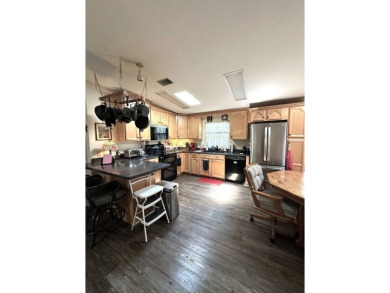This spacious residence of 2 bedroom features oasis landscaping on Schalamar Creek Golf and Country Club in Florida - for sale on GolfHomes.com, golf home, golf lot