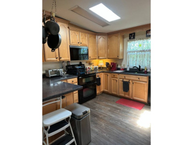 This spacious residence of 2 bedroom features oasis landscaping on Schalamar Creek Golf and Country Club in Florida - for sale on GolfHomes.com, golf home, golf lot