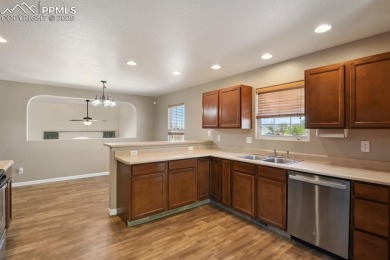 It is time to make this beautiful home yours!! Move-in ready on on Desert Hawk At Pueblo West in Colorado - for sale on GolfHomes.com, golf home, golf lot