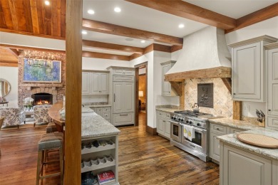 Welcome to a sophisticated mountain retreat on the banks of the on Cullasaja Club in North Carolina - for sale on GolfHomes.com, golf home, golf lot