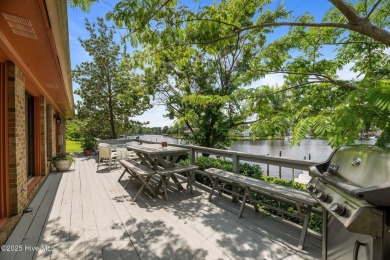 This Mediterranean-style brick home offers panoramic views of on Harbour Point Golf Club in North Carolina - for sale on GolfHomes.com, golf home, golf lot