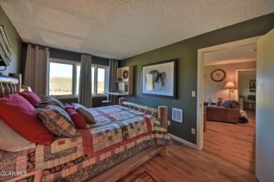 Move-in-ready 2-bedroom, 2-bathroom ski-in/ski-out condo located on Headwaters Golf Course At Granby Ranch in Colorado - for sale on GolfHomes.com, golf home, golf lot