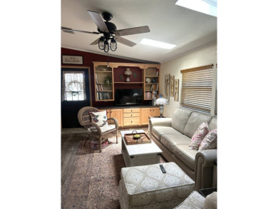 This spacious residence of 2 bedroom features oasis landscaping on Schalamar Creek Golf and Country Club in Florida - for sale on GolfHomes.com, golf home, golf lot
