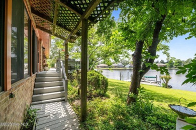 This Mediterranean-style brick home offers panoramic views of on Harbour Point Golf Club in North Carolina - for sale on GolfHomes.com, golf home, golf lot